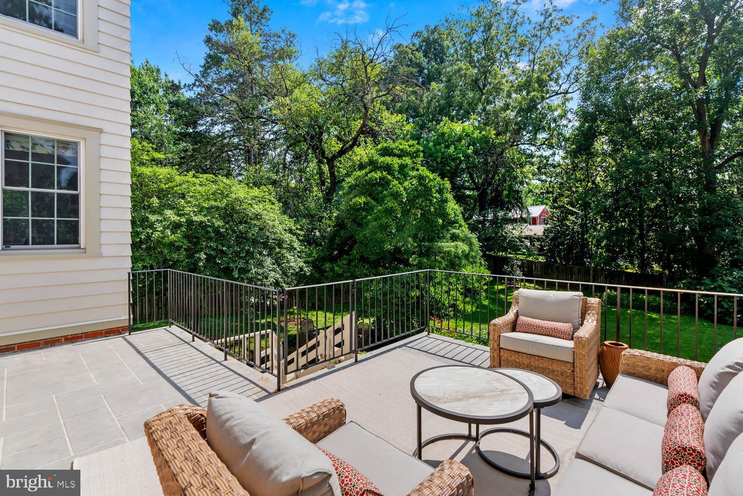 7406 Brookville Road Chevy Chase, MD 20815 - Photo 51 of 72 a view of a chair and tables in the balcony