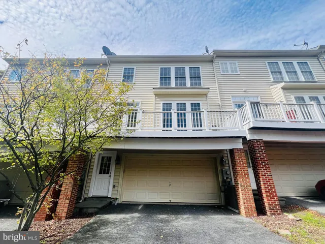 a house with trees in front of it