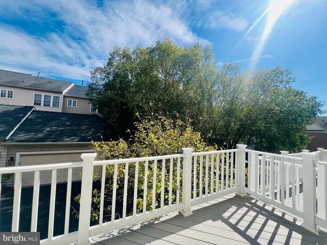 a view of a wooden fence