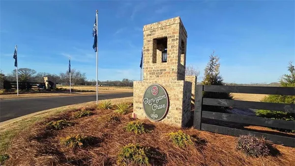 a very nice looking yard with a large window