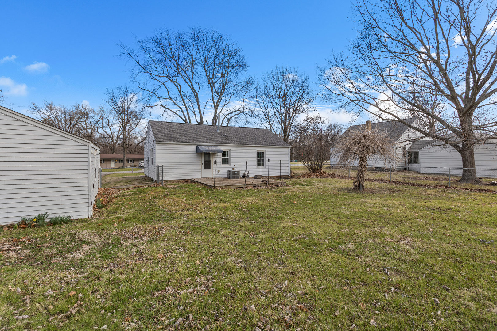1351 West Pershing Road Decatur, IL 62526 - Photo 21 of 24 a view of a house with a yard