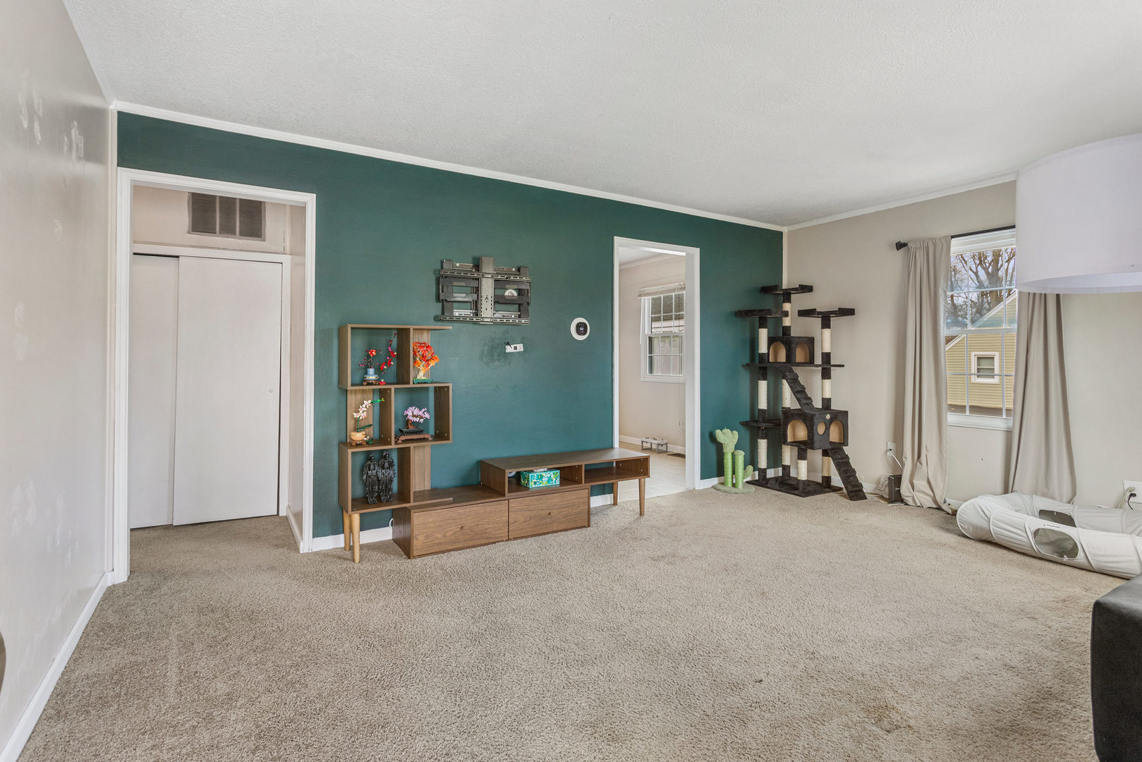 1351 West Pershing Road Decatur, IL 62526 - Photo 6 of 24 a view of a livingroom with toys