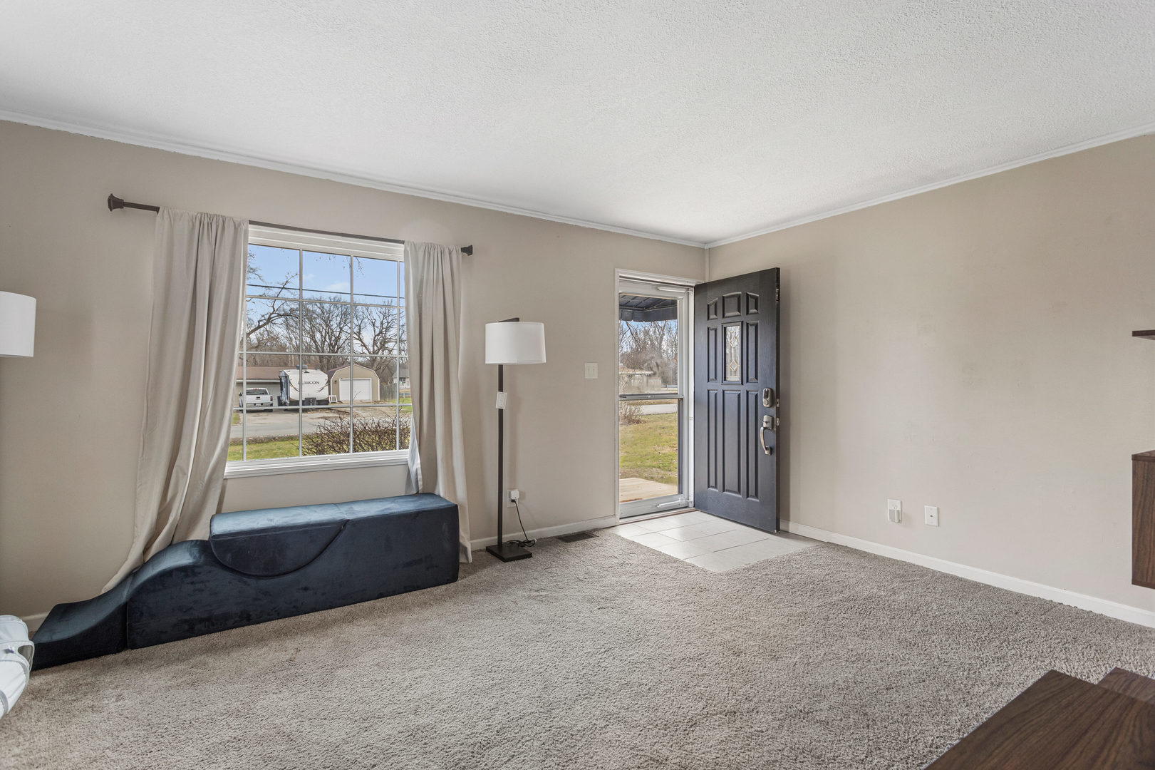1351 West Pershing Road Decatur, IL 62526 - Photo 8 of 24 an empty room with windows