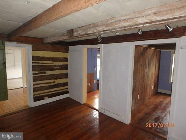 4709 Elmer Derr Road Frederick, MD 21703 - Photo 5 of 10 an empty room with wooden floor