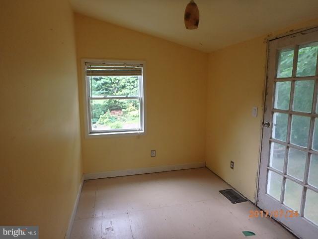 4709 Elmer Derr Road Frederick, MD 21703 - Photo 8 of 10 an empty room with a window
