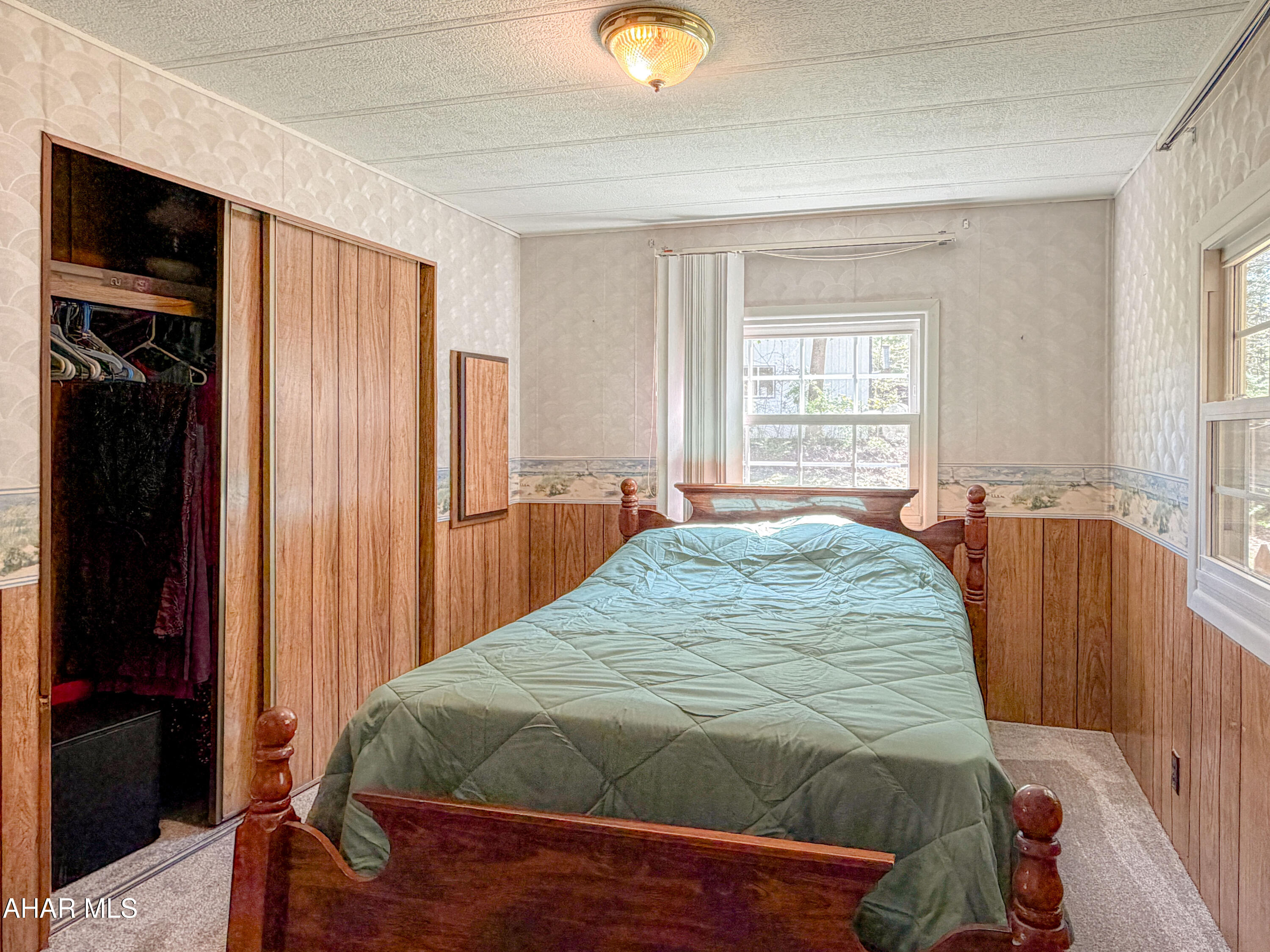 151 Pine Echo Road Everett, PA 15537 - Photo 34 of 51 a bedroom with a bed and a window