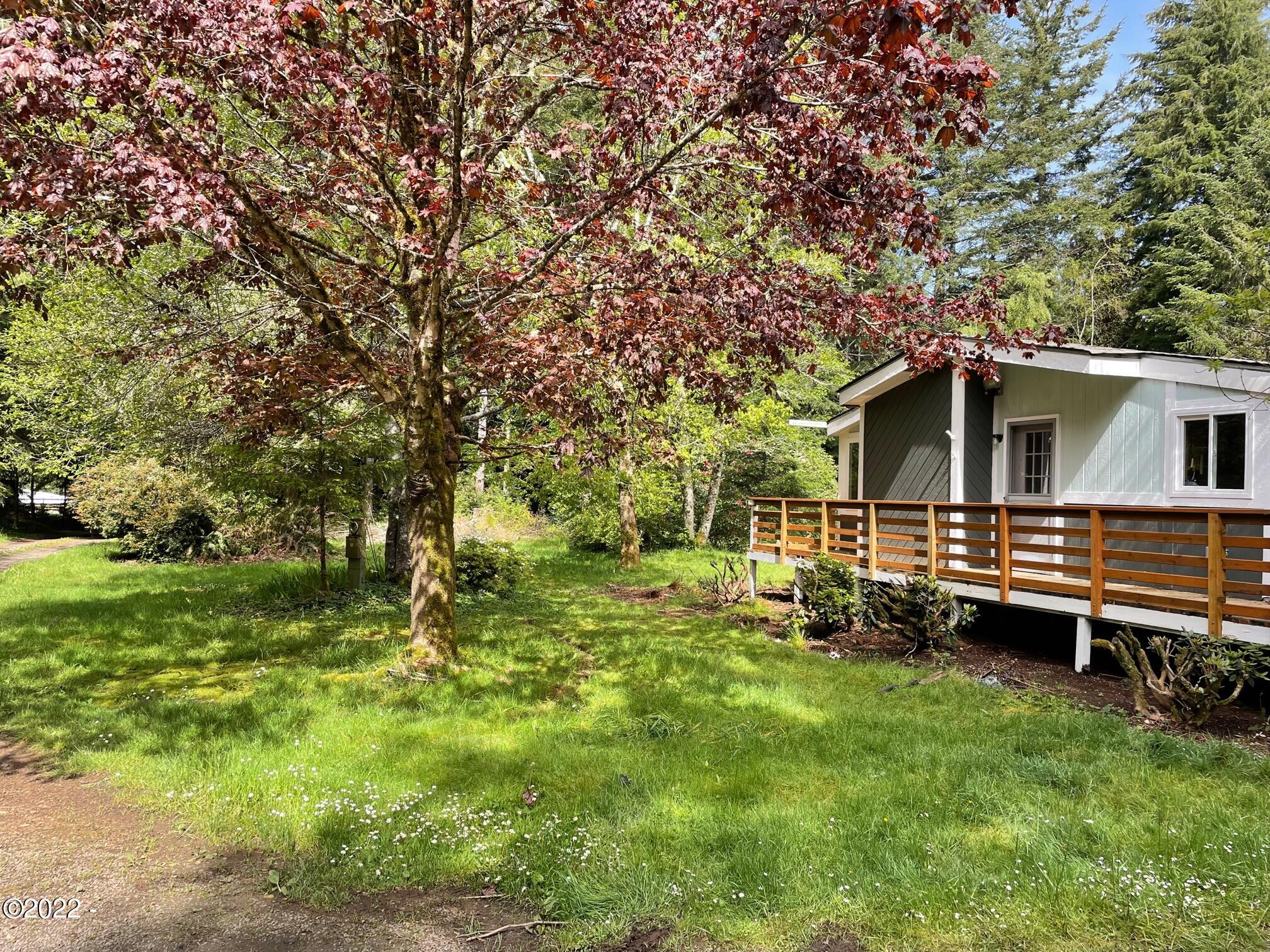 121 East Castle Road Waldport, OR 97394 - Photo 2 of 25 Wrap around Deck