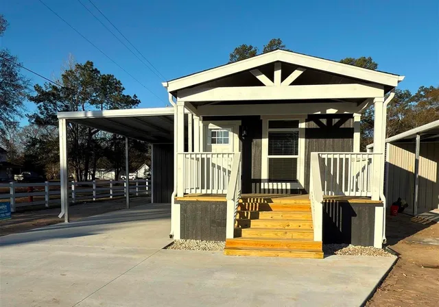 a front view of a house with a porch