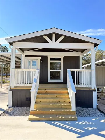 a front view of a house with a porch