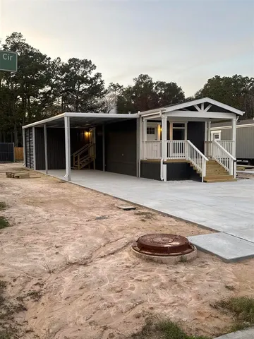 a front view of a house with yard