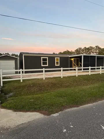 a front view of house with yard