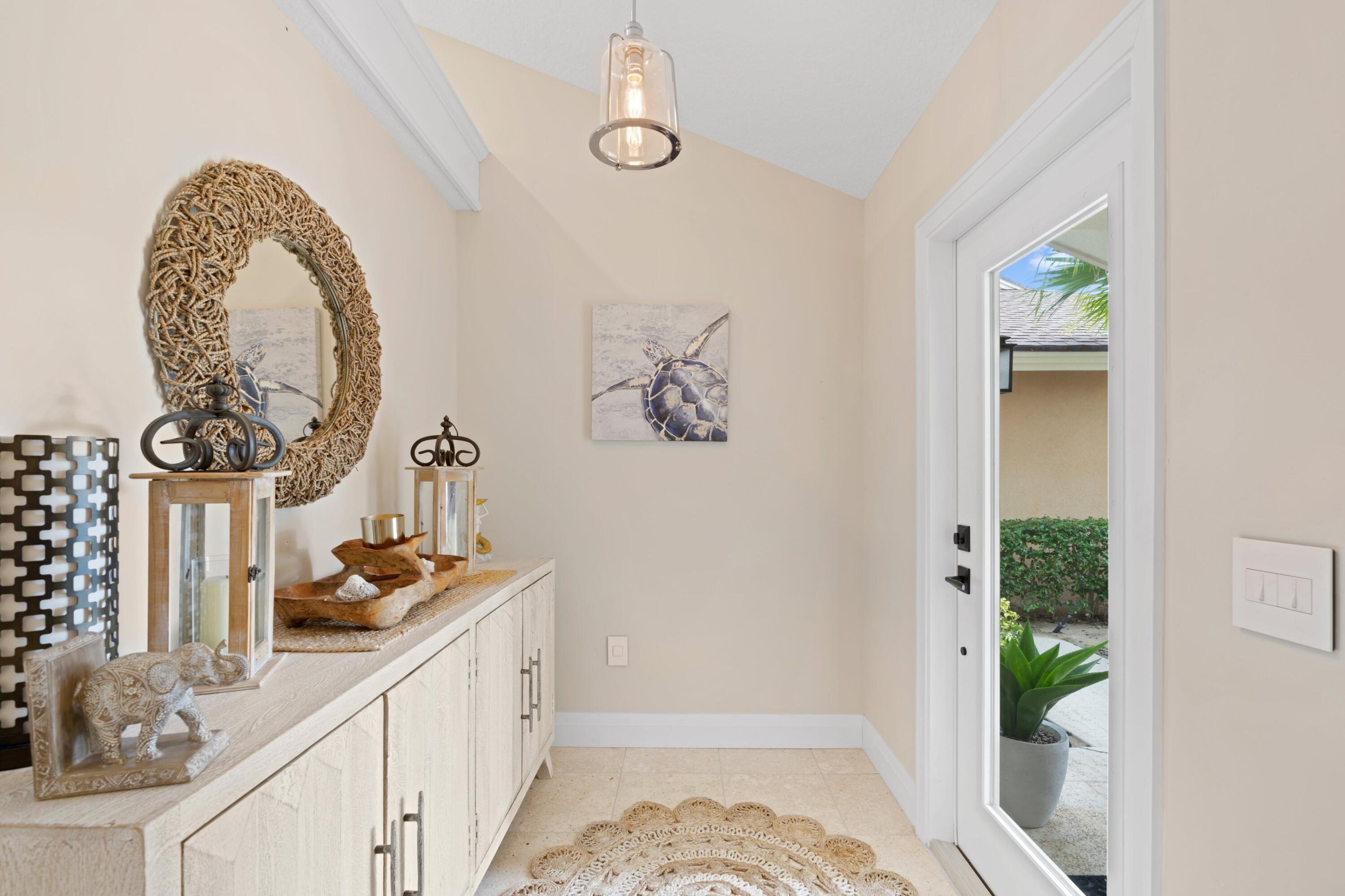 197 Ridge Road Jupiter, FL 33477 - Photo 23 of 44 a bathroom with a sink and a mirror