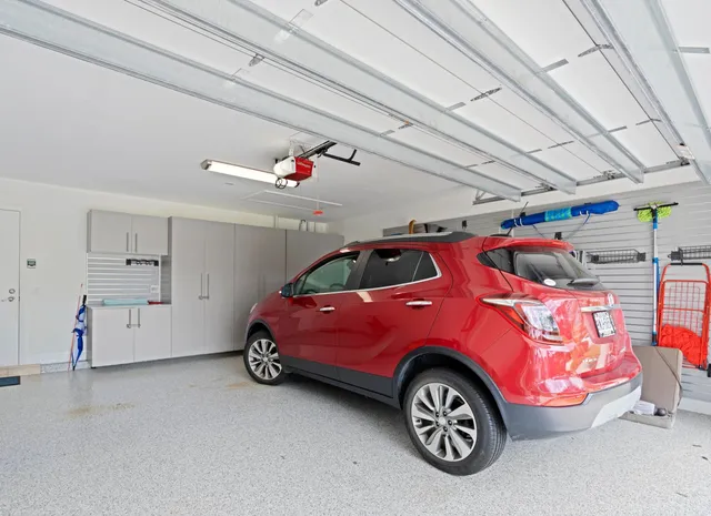 a blue car parked in a garage