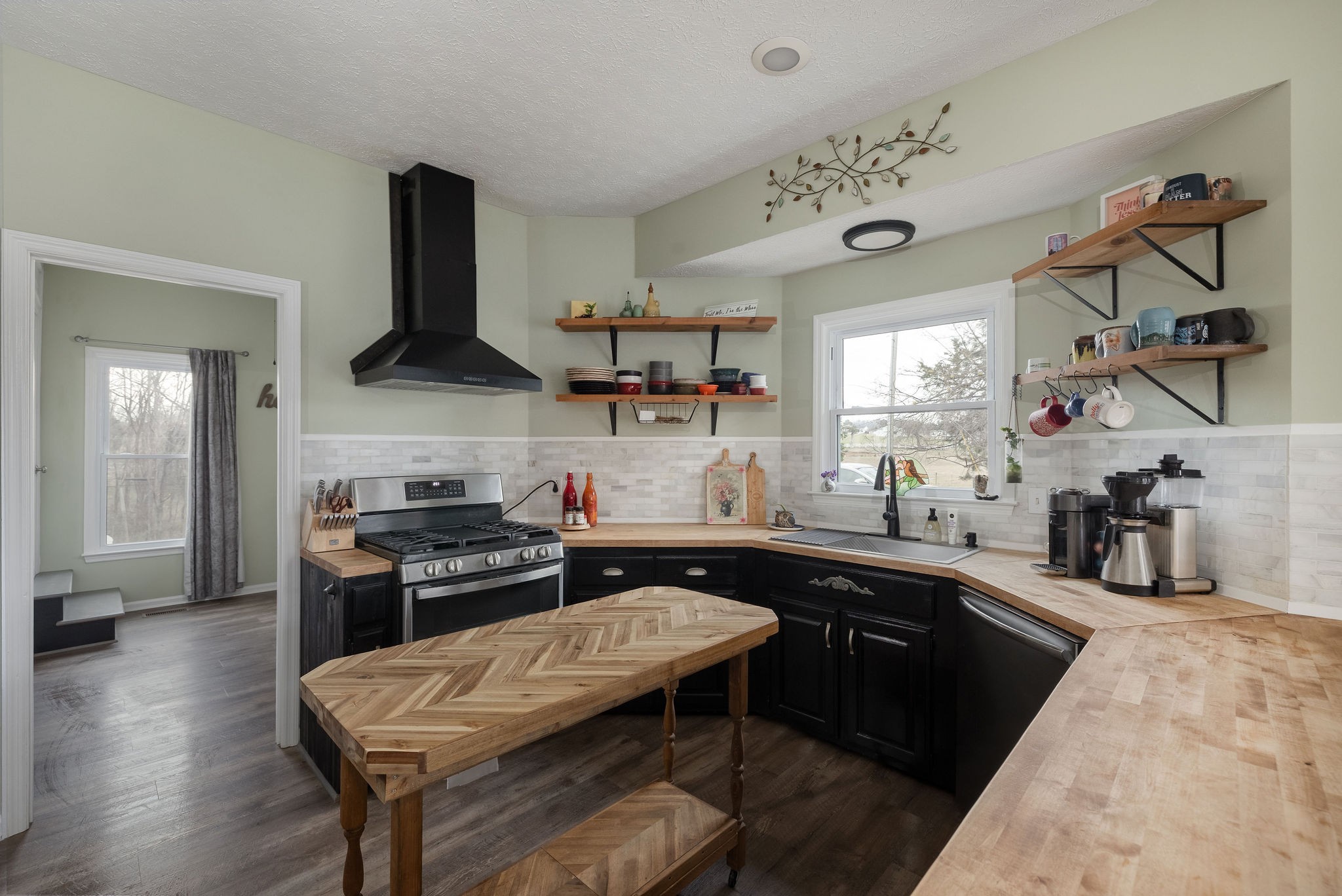 95 Old 25 Loop Castalian Springs, TN 37031 - Photo 16 of 93 a kitchen with a stove a sink and a refrigerator