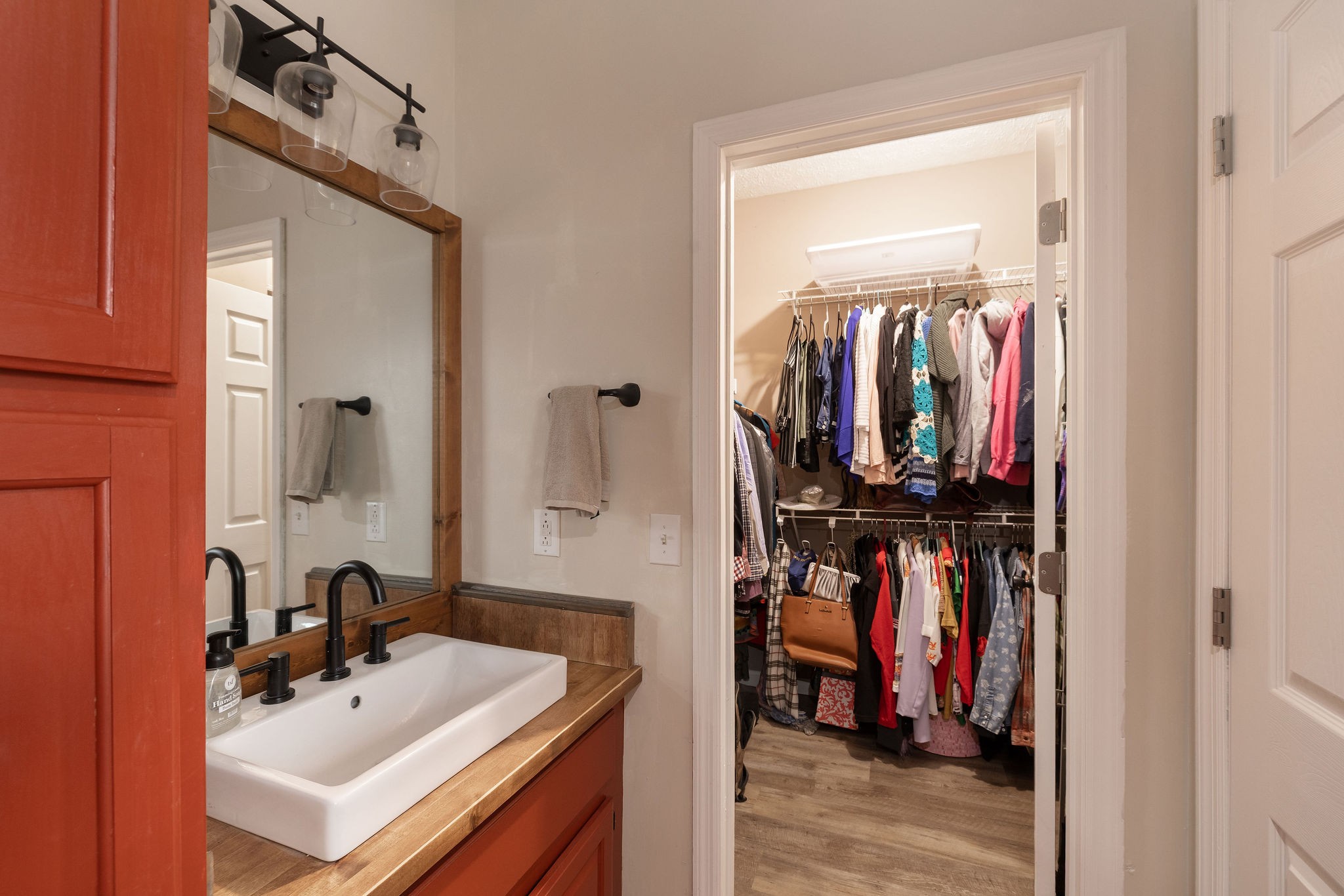 95 Old 25 Loop Castalian Springs, TN 37031 - Photo 30 of 93 a bathroom with a sink vanity and a mirror