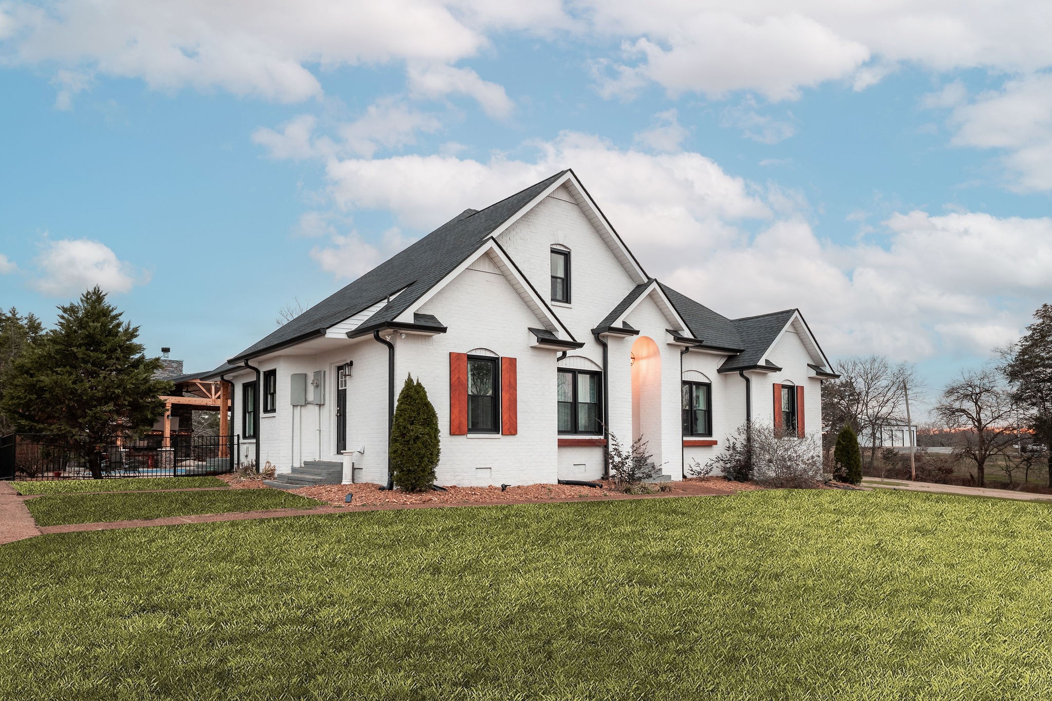 95 Old 25 Loop Castalian Springs, TN 37031 - Photo 3 of 93 a view of a white house next to a yard with big trees