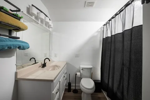 a backyard of a house with lots of green space