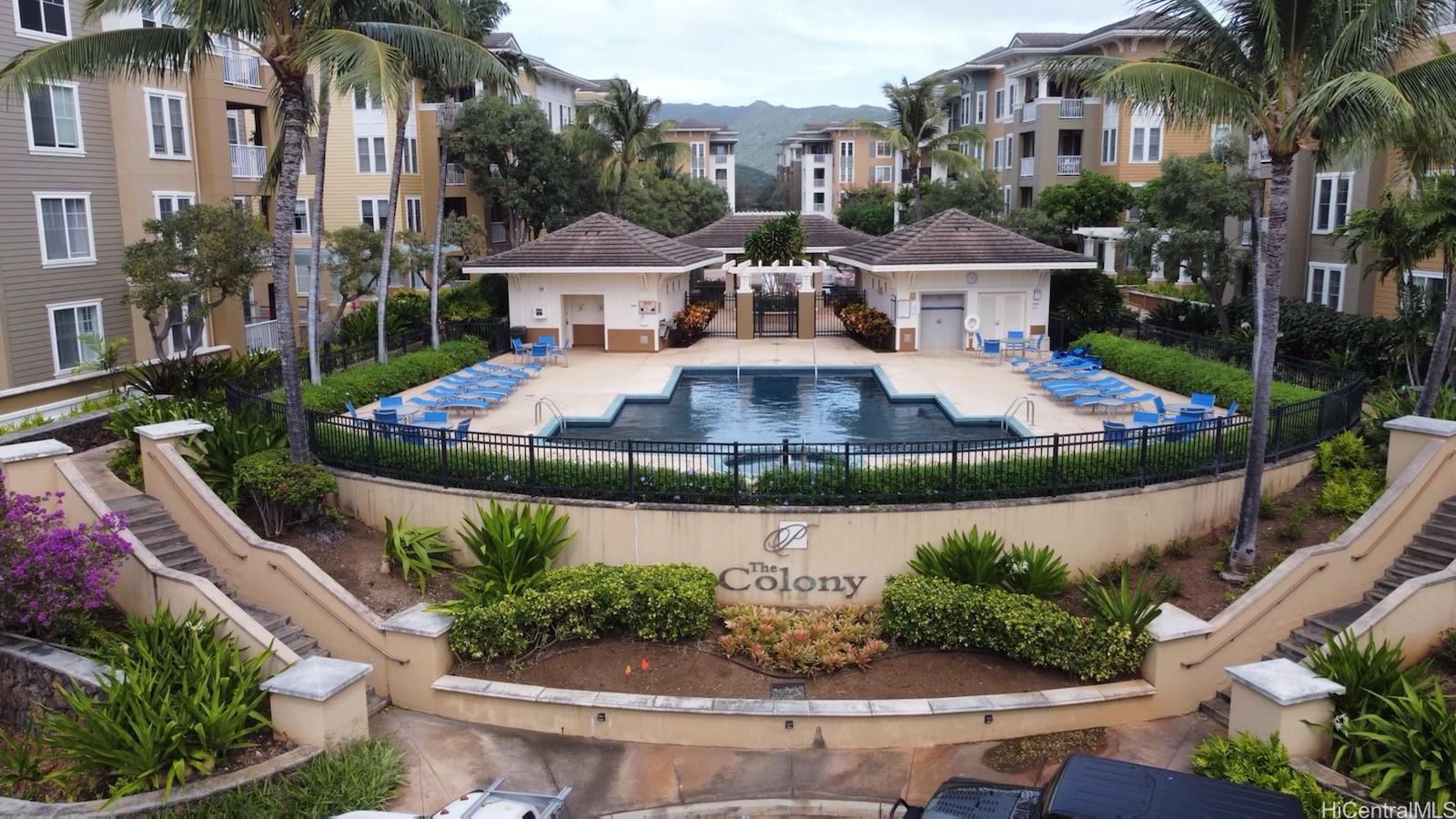 520 Lunalilo Home Road, Unit 7108 Honolulu, HI 96825 - Photo 1 of 1 a view of a house with a yard and potted plants