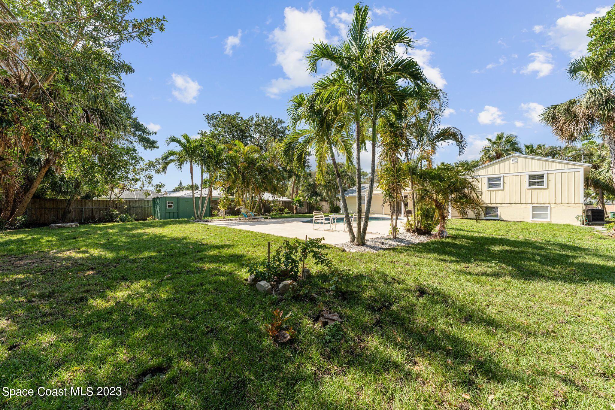 2007 Oak Street Melbourne Beach, FL 32951 - Photo 20 of 26 a view of house with yard