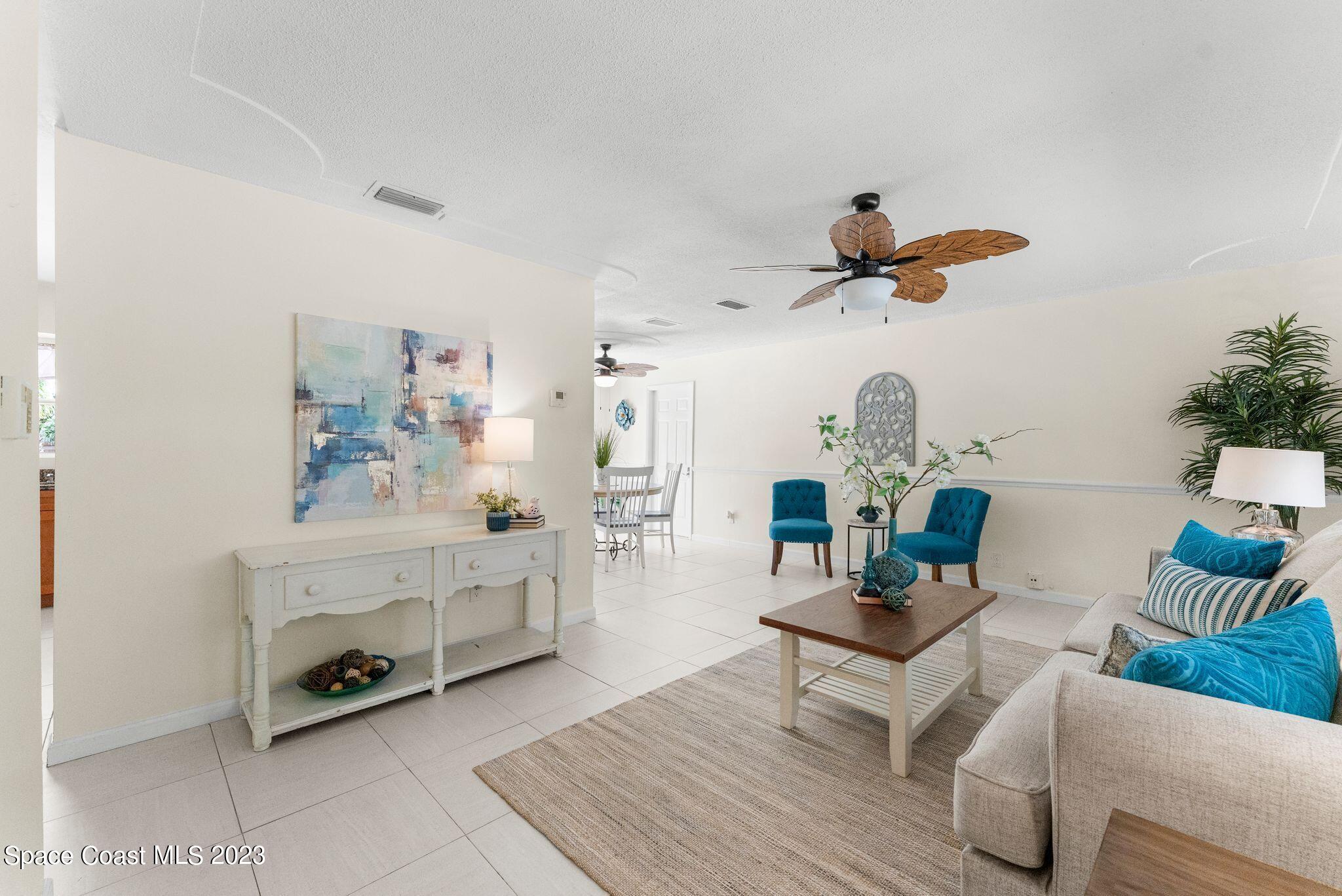 2007 Oak Street Melbourne Beach, FL 32951 - Photo 5 of 26 a living room with furniture and decor