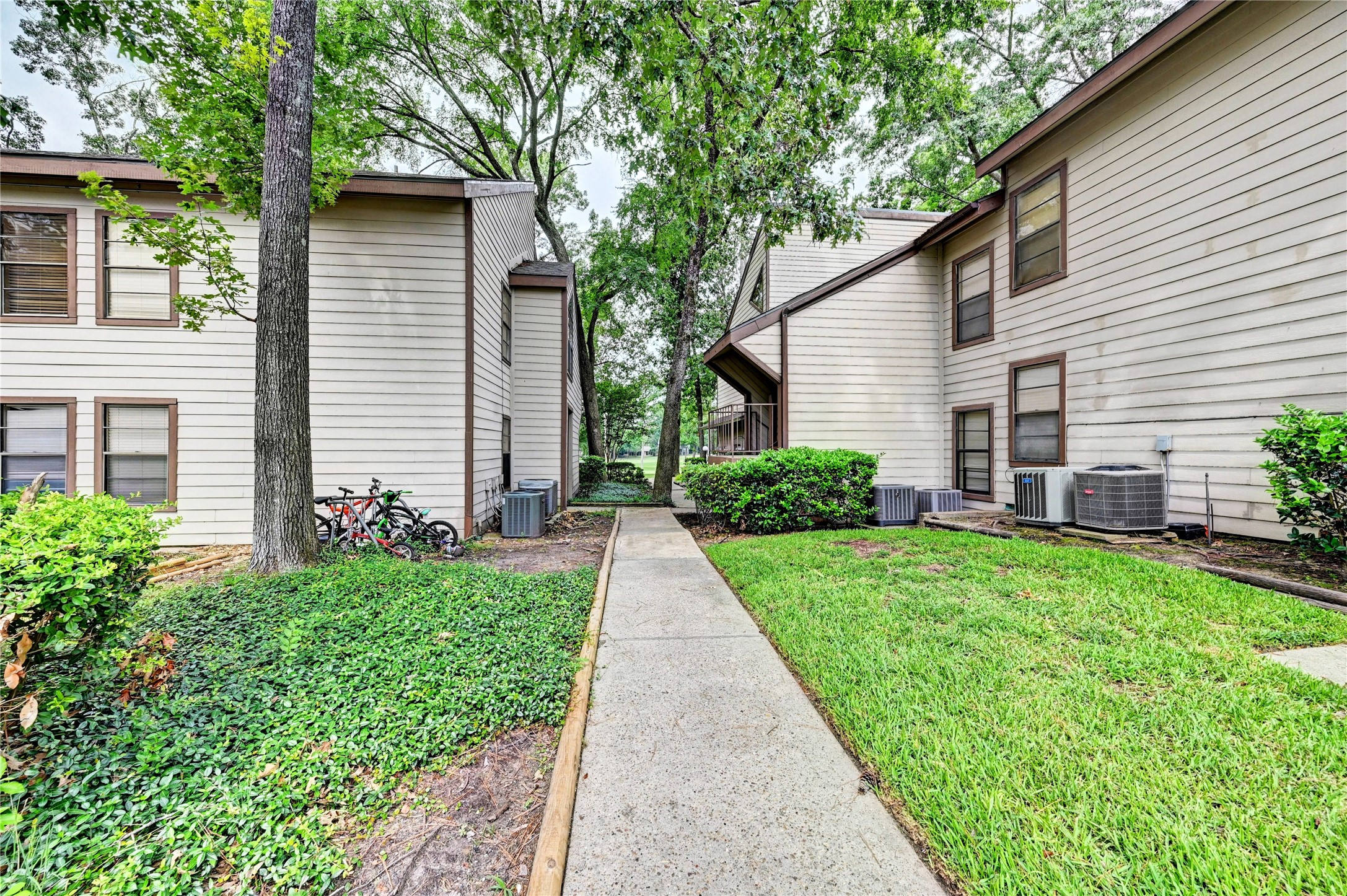 12900 Walden Road, Unit 6 Montgomery, TX 77356 - Photo 30 of 39 Your view of many walkways to the golf course.