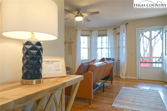 a living room with furniture and a table