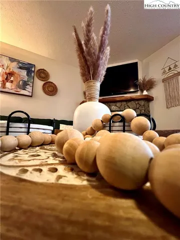 a bedroom with bed and a night stand