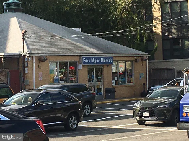 a view of a car parked front of a house