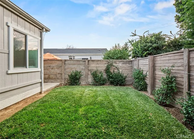 a view of a backyard with garden