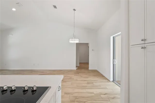 a kitchen that has a sink and a window