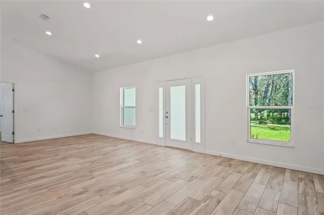 an empty room with windows