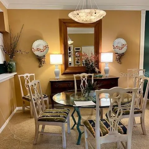 a view of a dining room with furniture