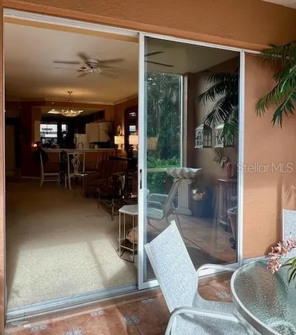 a bedroom with a bed and a mirror