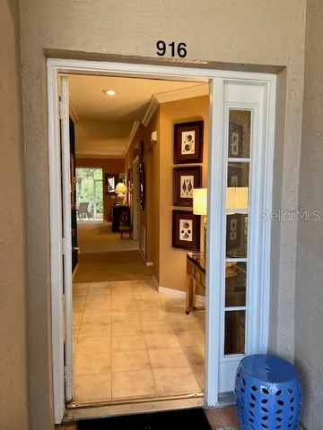a kitchen with stainless steel appliances granite countertop a refrigerator and a stove