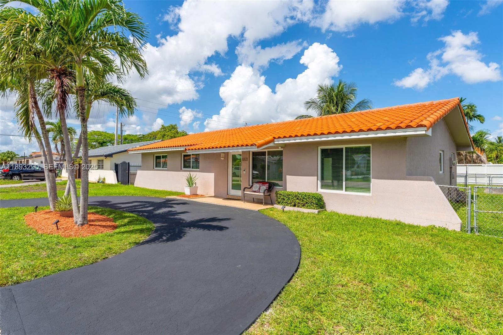 10121 Southwest 4th Street Miami, FL 33174 - Photo 1 of 31 a front view of a house with a yard and garage