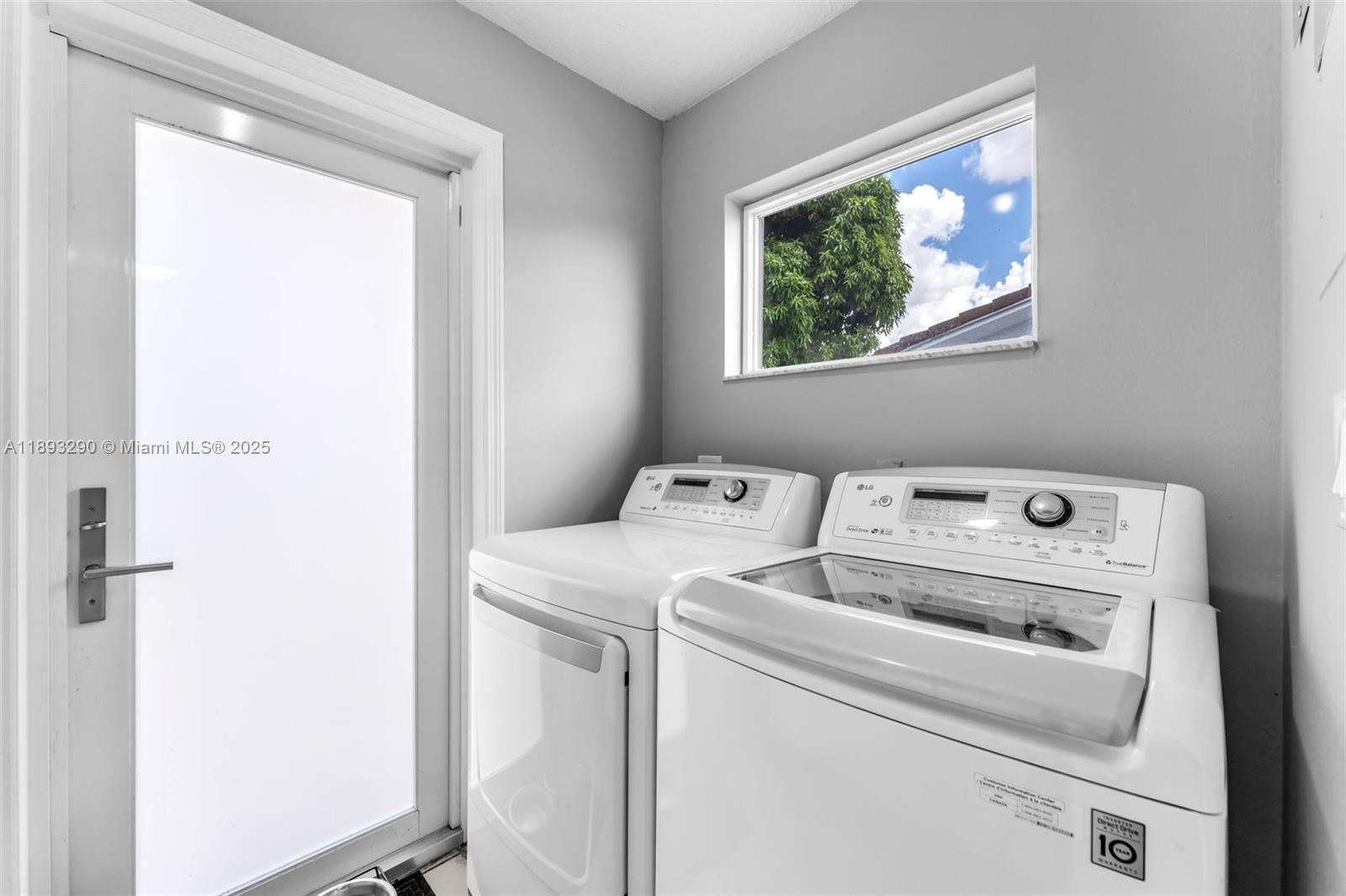 10121 Southwest 4th Street Miami, FL 33174 - Photo 13 of 31 a view of storage and utility room with washer and dryer