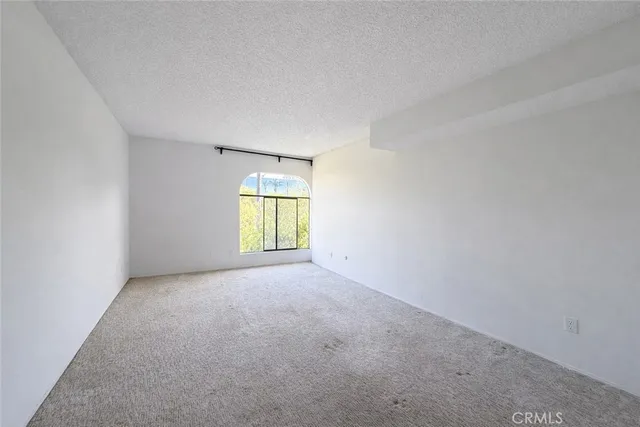 a bathroom with a mirror and a shower