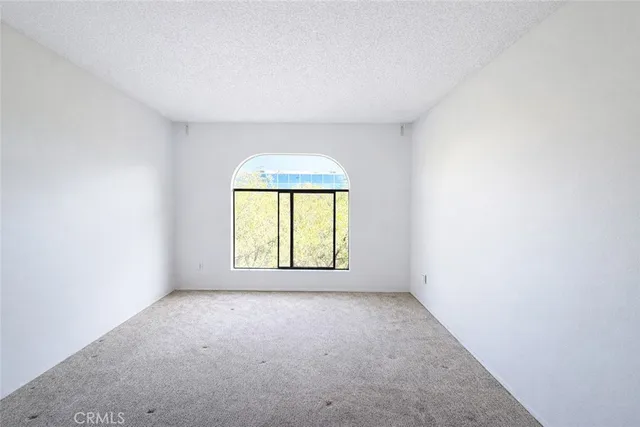 a bathroom with a toilet and a bathtub
