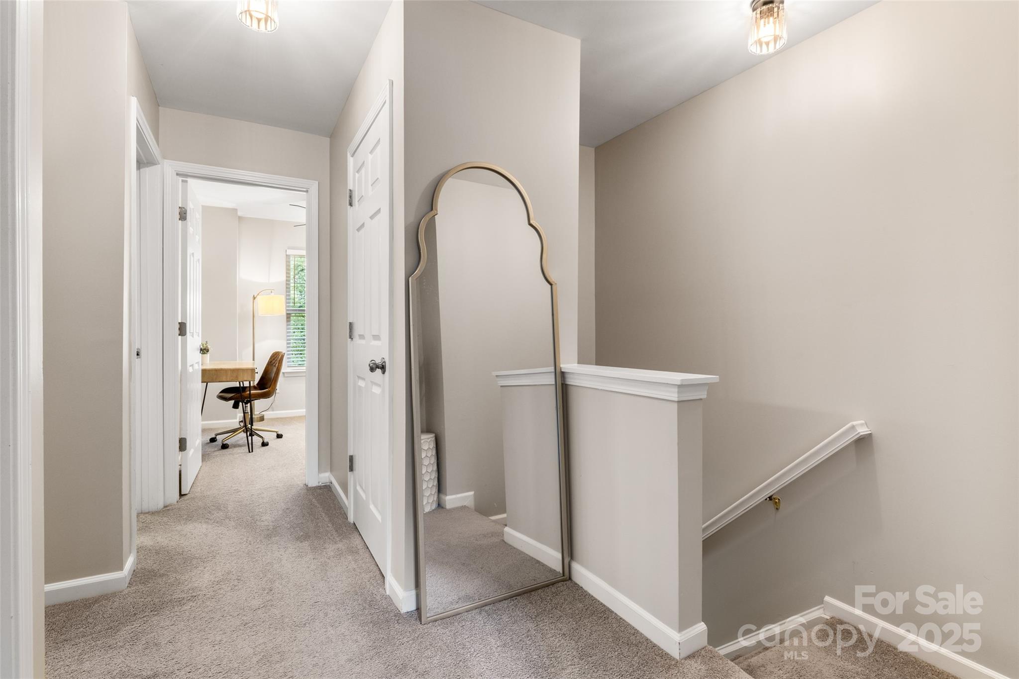 9651 Bailey Road Cornelius, NC 28031 - Photo 18 of 32 a view of a hallway view with staircase