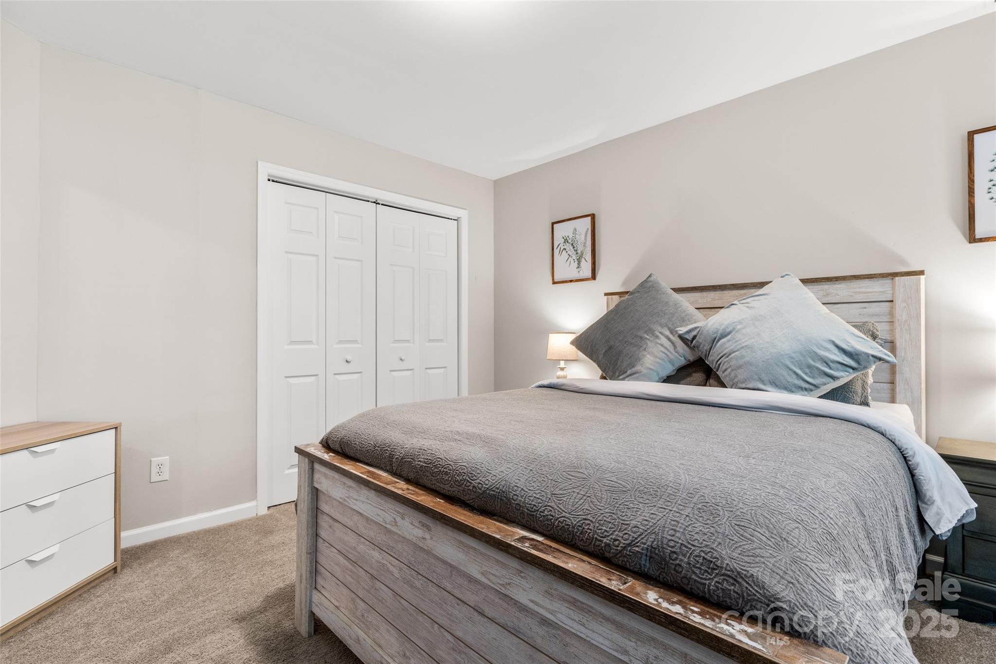 9651 Bailey Road Cornelius, NC 28031 - Photo 27 of 32 a bedroom with a bed and a window