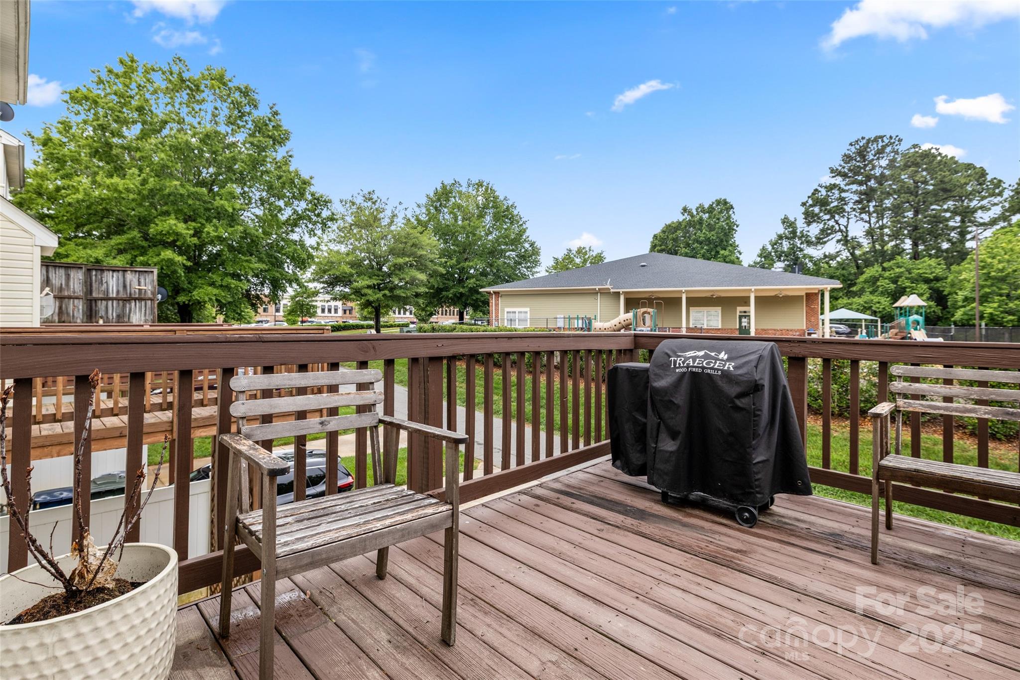 9651 Bailey Road Cornelius, NC 28031 - Photo 30 of 32 a view of a chair and table on the deck