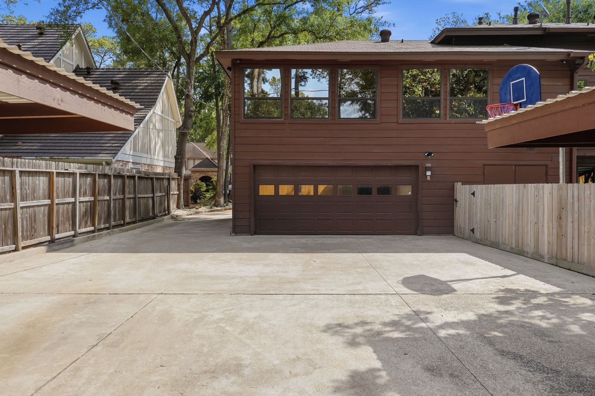 15007 Benfer Road Houston, TX 77069 - Photo 38 of 42 There is AMPLE PARKING out of sight from the neighbors and TESLA EV Charger!