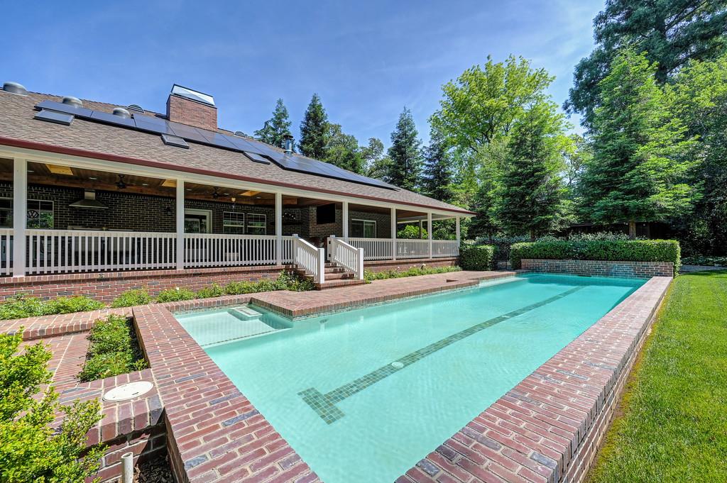 3557 Val Verde Road Loomis, CA 95650 - Photo 54 of 71 a view of a house with swimming pool and a yard
