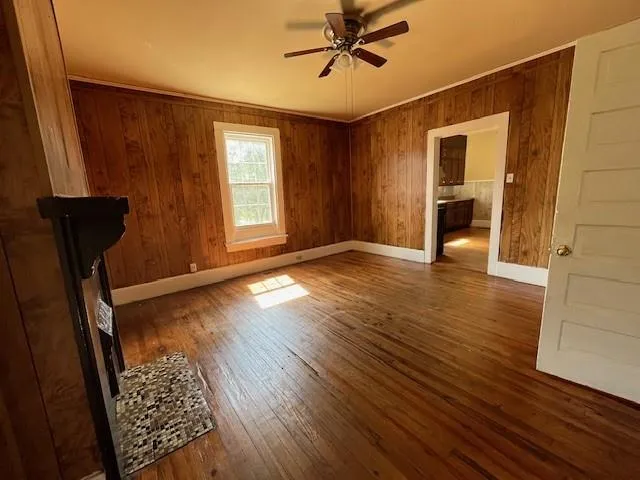 a view of front of house with a yard