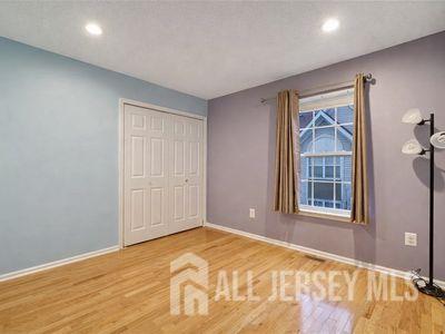 31 Edinburgh Court Edison, NJ 08820 - Photo 25 of 25 a view of an empty room with a window