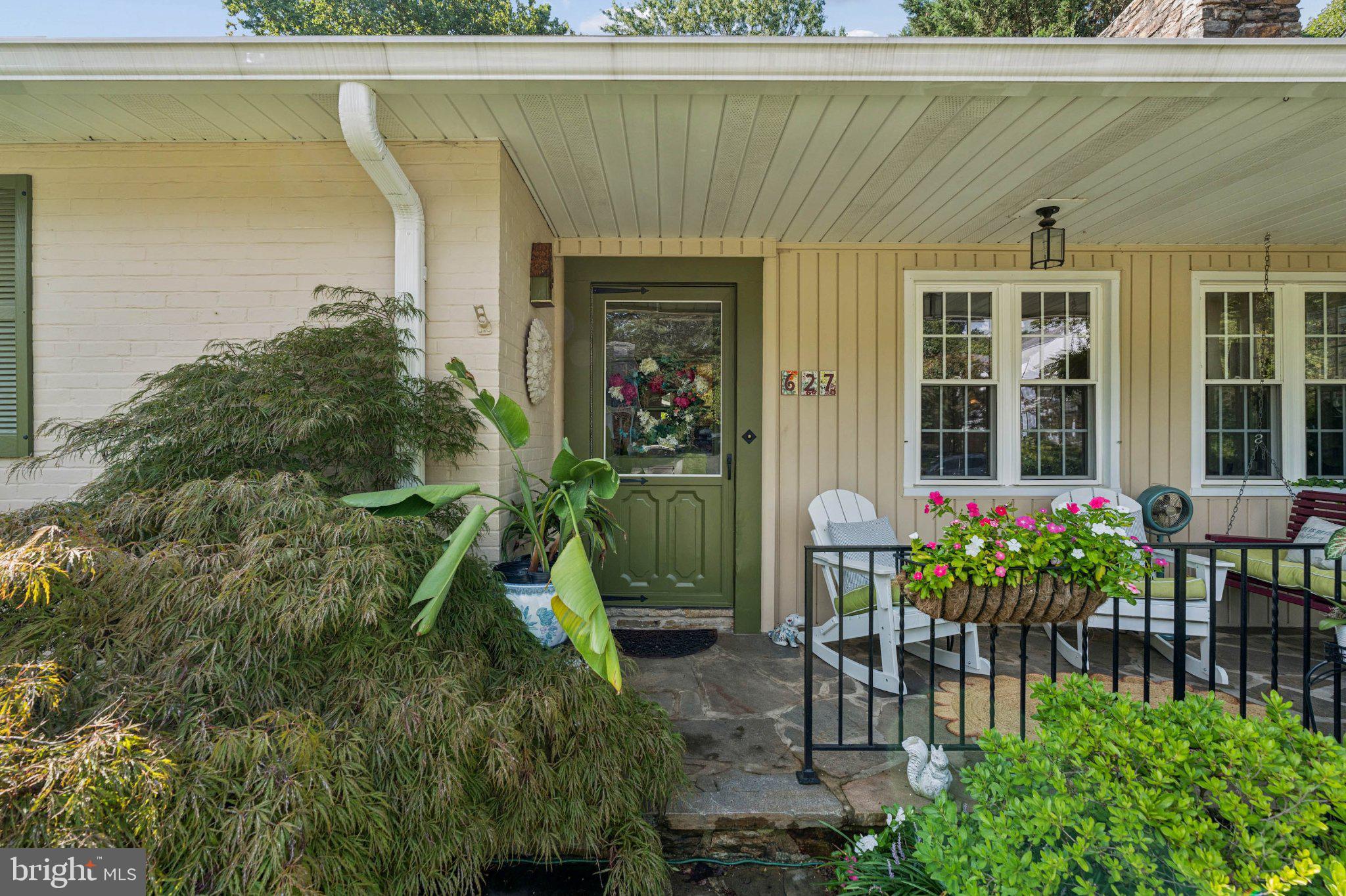 627 Yarmouth Road Baltimore, MD 21286 - Photo 3 of 59 Charming entryway with lush greenery.