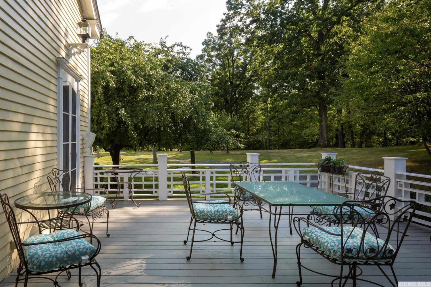 618 A Stonewall Road Austerlitz, NY 12060 - Photo 11 of 37 a view of chairs and table in the patio