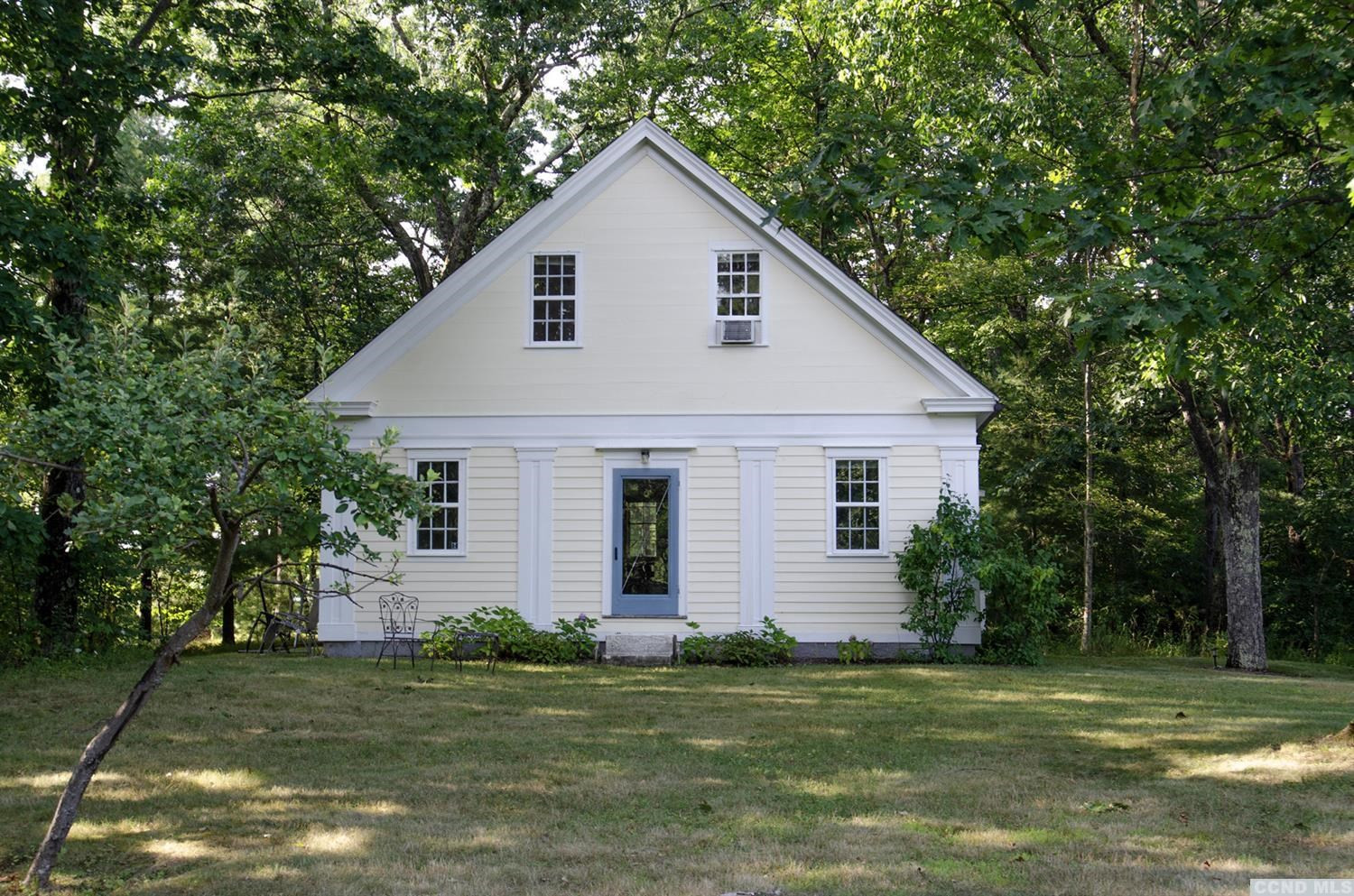 618 A Stonewall Road Austerlitz, NY 12060 - Photo 23 of 37 a front view of a house with a garden