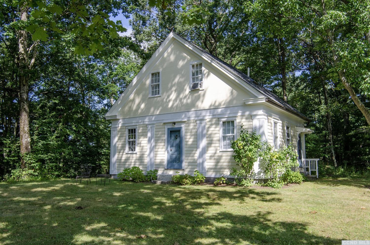 618 A Stonewall Road Austerlitz, NY 12060 - Photo 24 of 37 a front view of a house with a yard