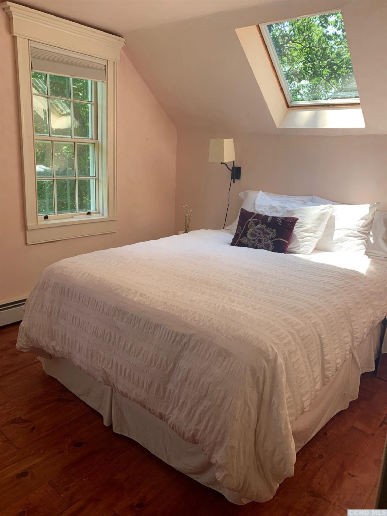 618 A Stonewall Road Austerlitz, NY 12060 - Photo 35 of 37 a bedroom with a bed and a window